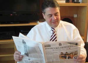 Sigmar Gabriel, 52, enjoying a good read at the party headquarters in Berlin