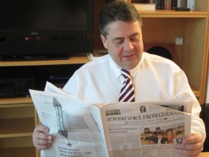 Sigmar Gabriel, 52, enjoying a good read at the party headquarters in Berlin
